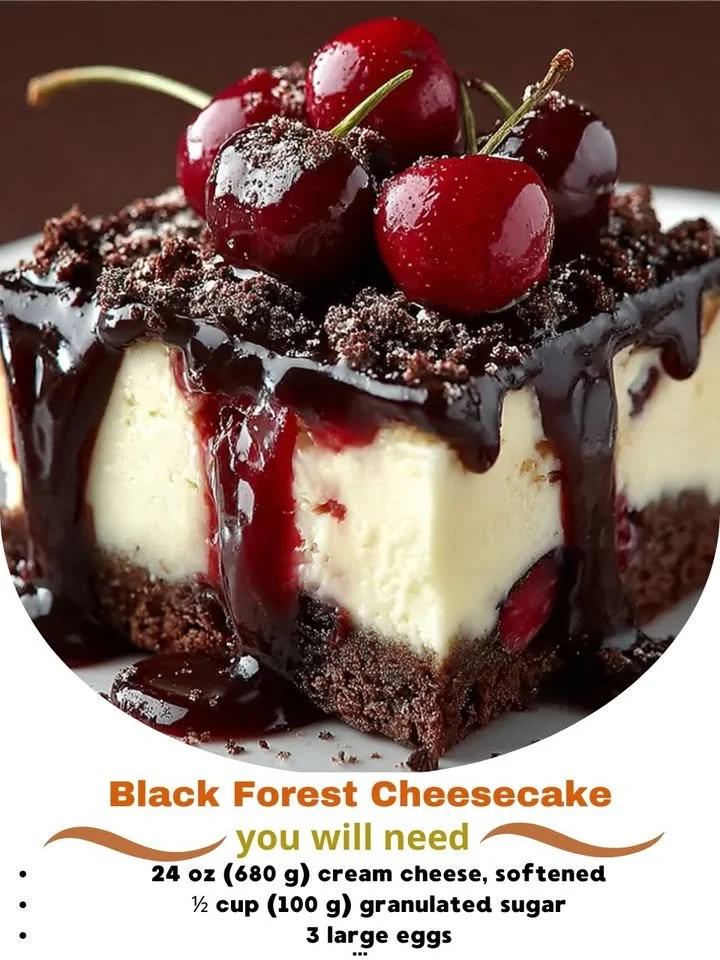 Delicious slice of Black Forest Cheesecake topped with cherries and whipped cream