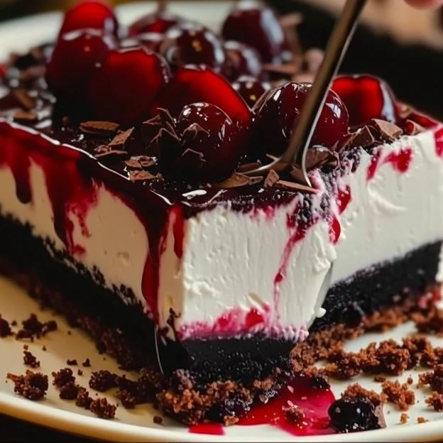 Delicious Black Forest Cheesecake Delight Bars with chocolate and cherries.