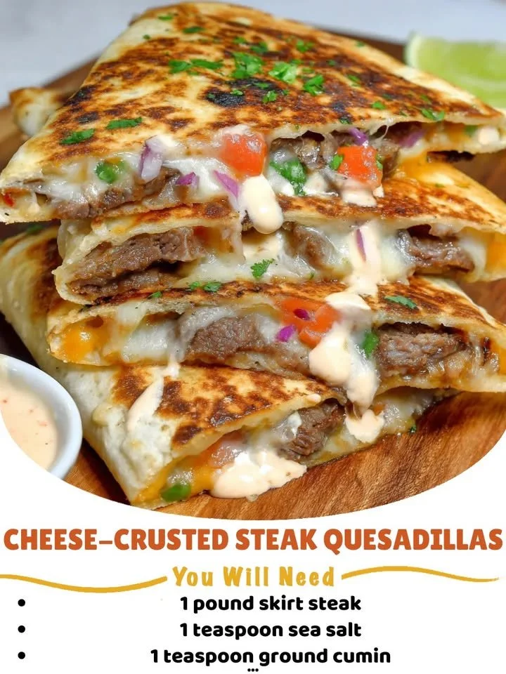 Cheese-crusted steak quesadillas served on a plate with toppings