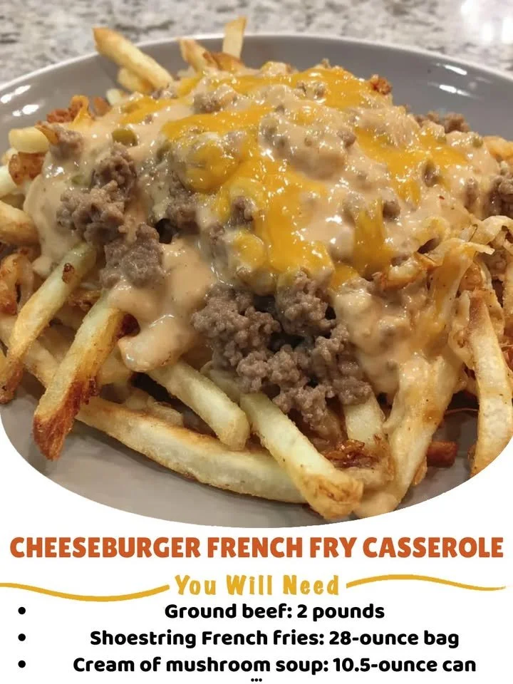 Cheeseburger French fry casserole topped with melted cheese and garnished.