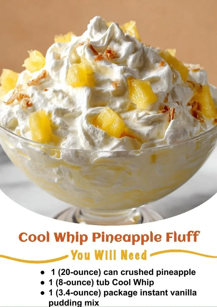 Bowl of Cool Whip Pineapple Fluff dessert with pineapple chunks and whipped cream