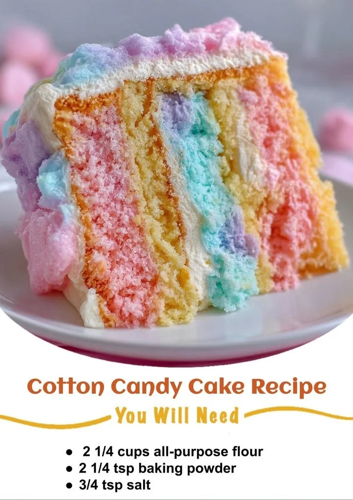 Colorful cotton candy cake topped with fluffy sugar and sweets