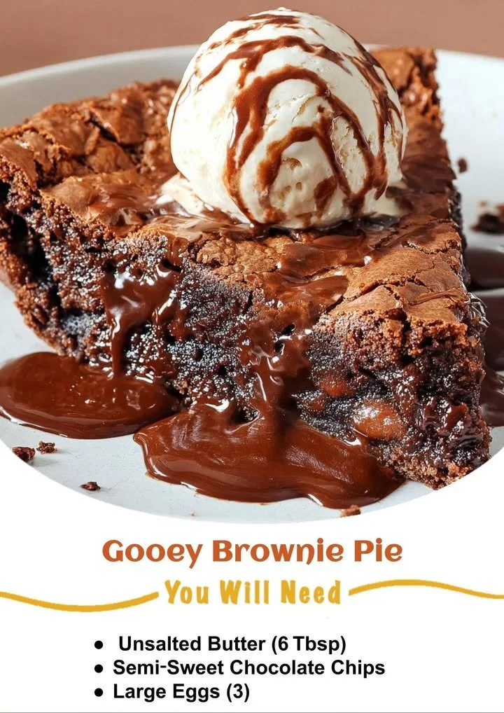 Gooey brownie pie with chocolate topping and a slice cut out