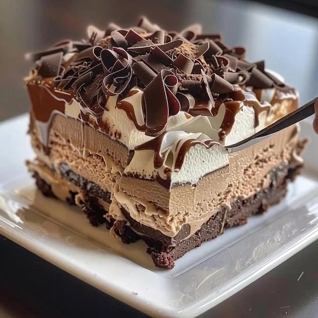 Mocha brownie ice cream cake with layers of brownie and mocha ice cream
