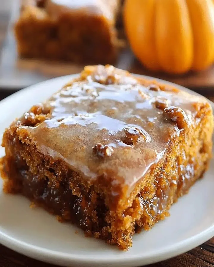 Delicious Pumpkin Honey Bun Cake with frosting on a plate