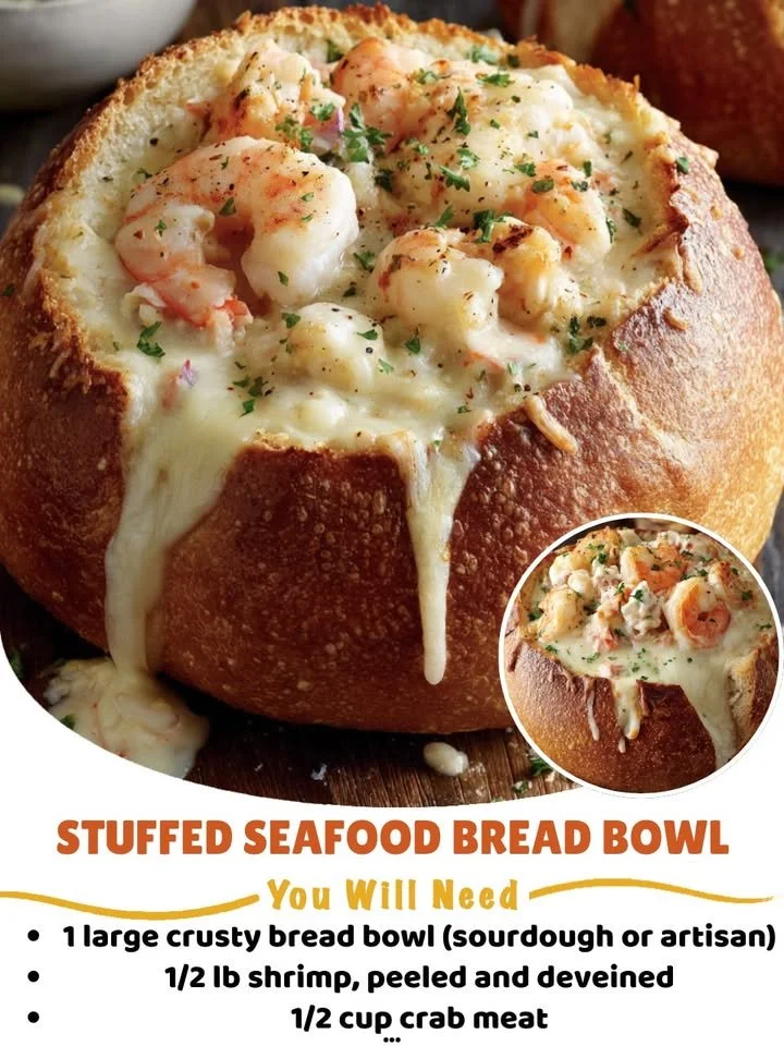 Delicious stuffed seafood bread bowl filled with shrimp and crab