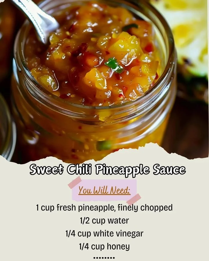 Bowl of sweet chili pineapple sauce with a fresh pineapple and chili peppers