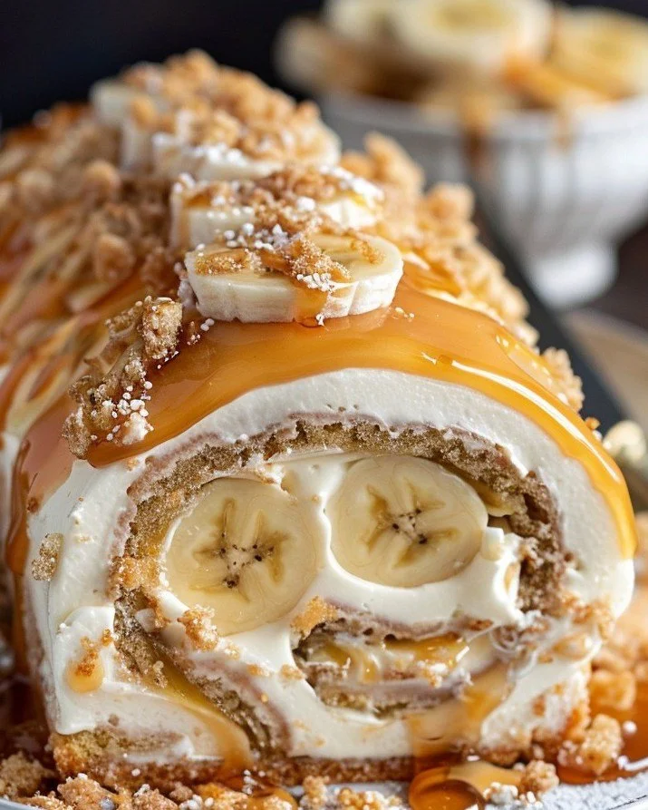 Delicious Banana Caramel Roulade served on a plate with caramel drizzle.