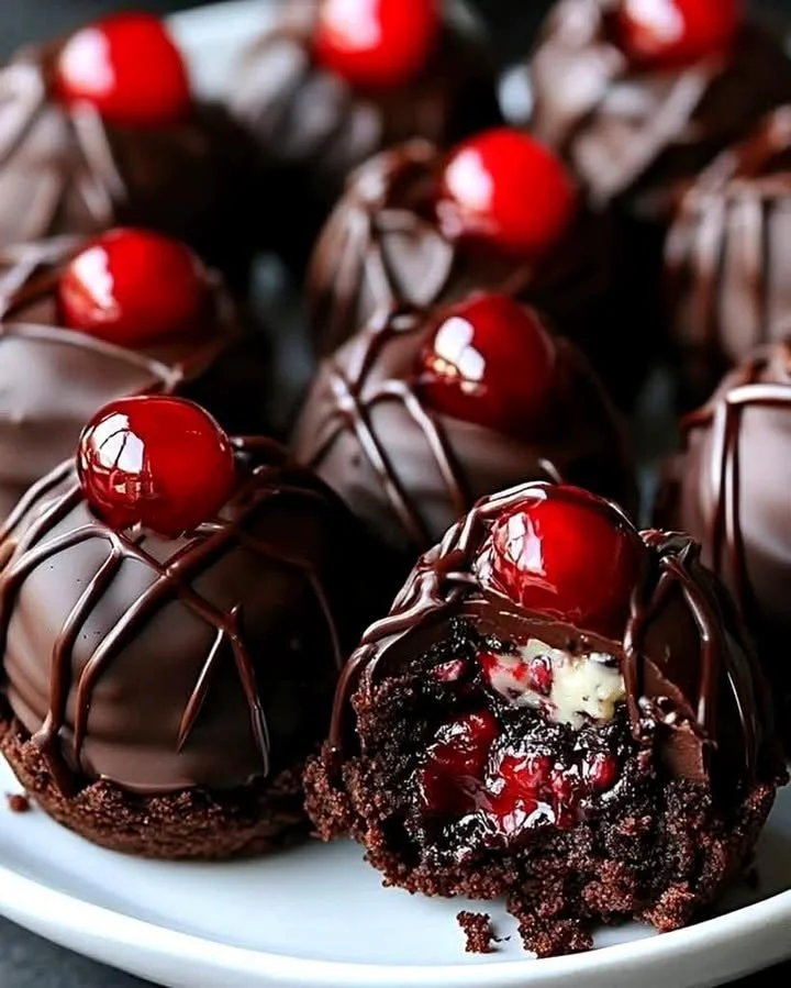 Black Forest Cookie Dough Brownie Bombs with chocolate and cherry toppings