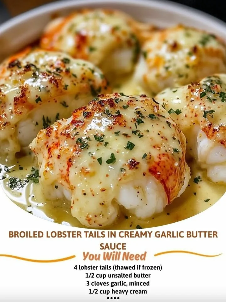 Broiled lobster tails served with creamy garlic butter sauce