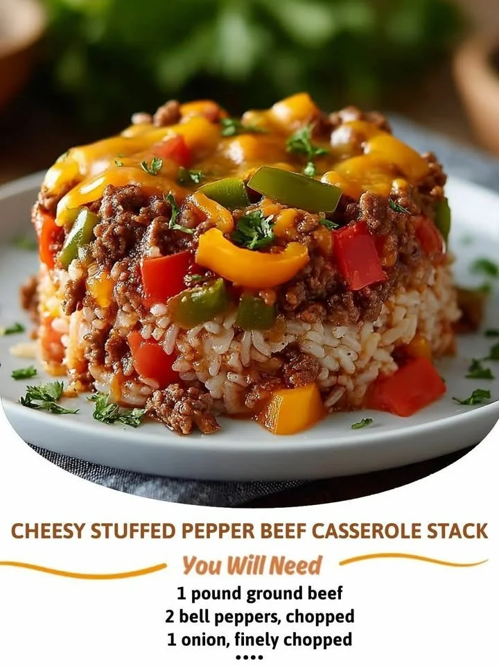 Cheesy stuffed pepper beef casserole topped with melted cheese and peppers