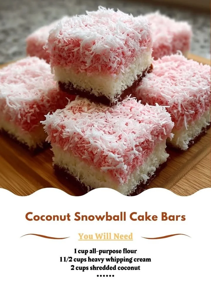 Delicious Coconut Snowball Cake Bars with coconut flakes and creamy frosting