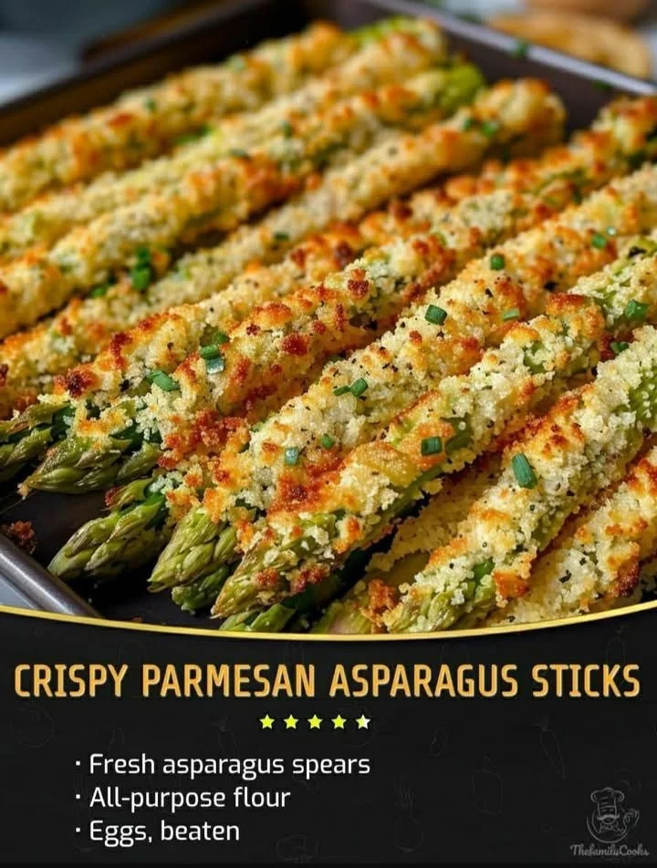 Crispy Parmesan asparagus sticks on a plate, garnished with herbs.