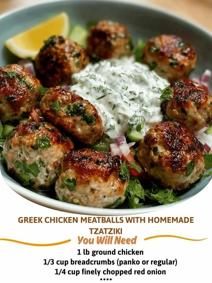 Greek chicken meatballs with homemade tzatziki sauce on a plate