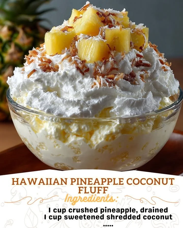 Hawaiian Pineapple Coconut Fluff dessert served in a bowl with tropical garnishes.