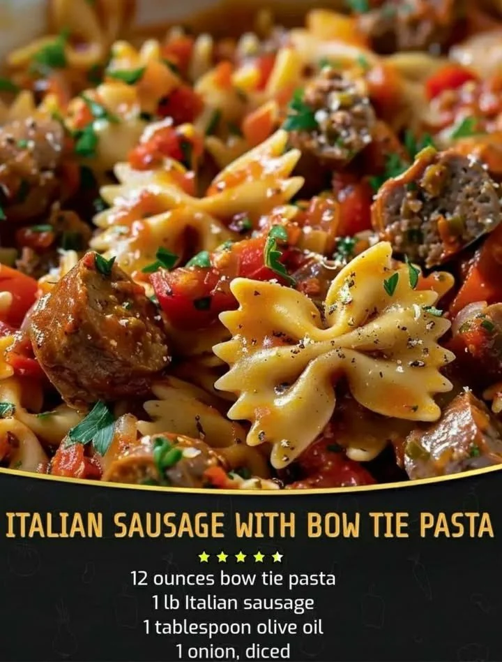 Plate of Italian sausage with bow tie pasta garnished with herbs