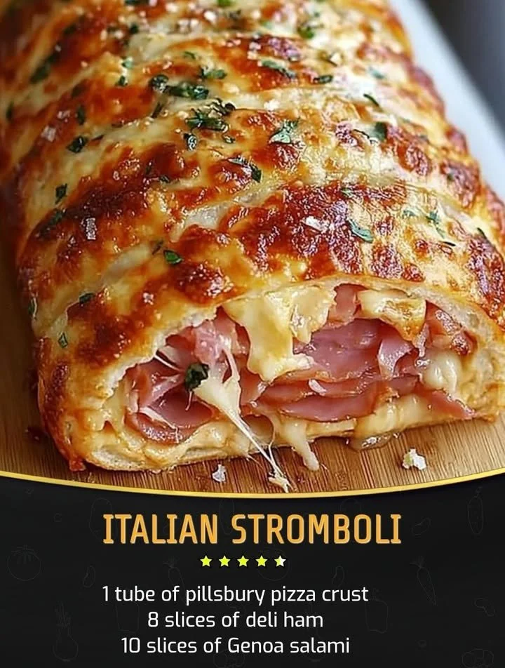 Delicious Italian Stromboli filled with cheese and meats on a wooden table.