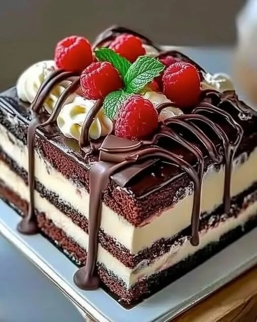 Decadent Triple Chocolate Mousse Cake with layers of rich chocolate