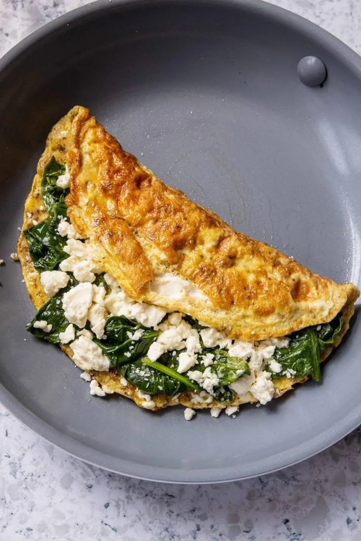 Delicious and nutritious spinach feta omelet cooked in just 15 minutes