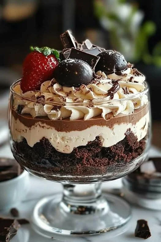 Delicious Baileys Chocolate Cheesecake Trifle served in a glass dish.