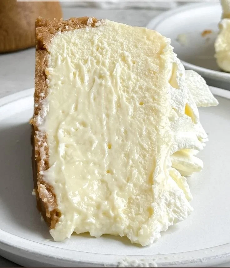 Delicious slice of New York Style Cheesecake on a plate