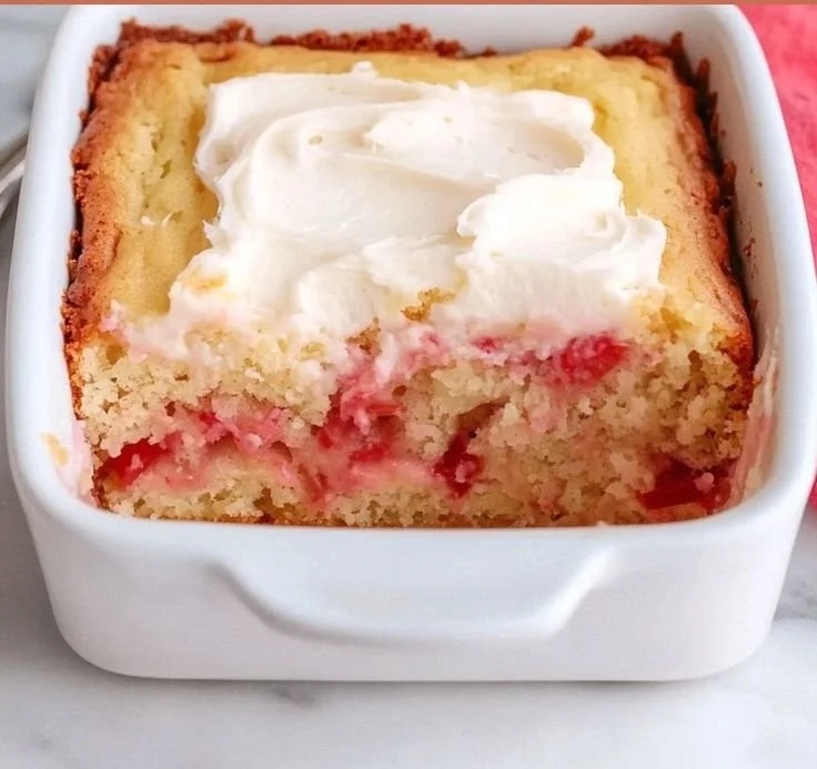 Delicious rhubarb cake made with cake mix, showcasing its vibrant color and texture.