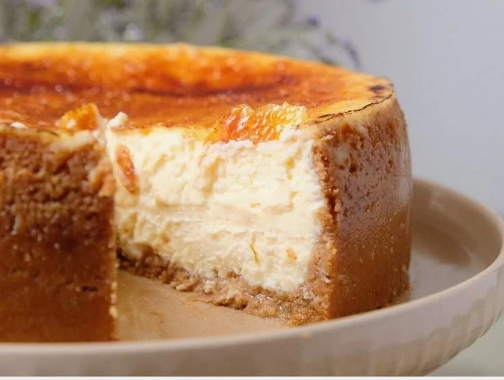 Slice of Burnt Cream Cheesecake with caramelized top and creamy texture