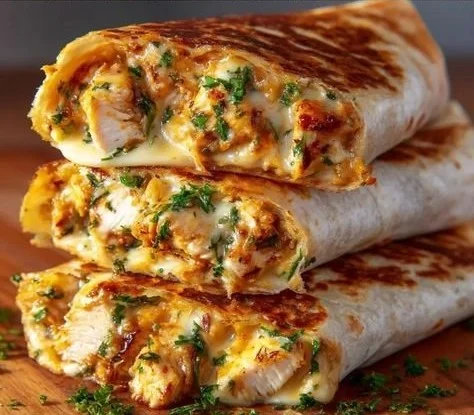 Cheesy Garlic Chicken Wraps filled with melted cheese and garlic flavor