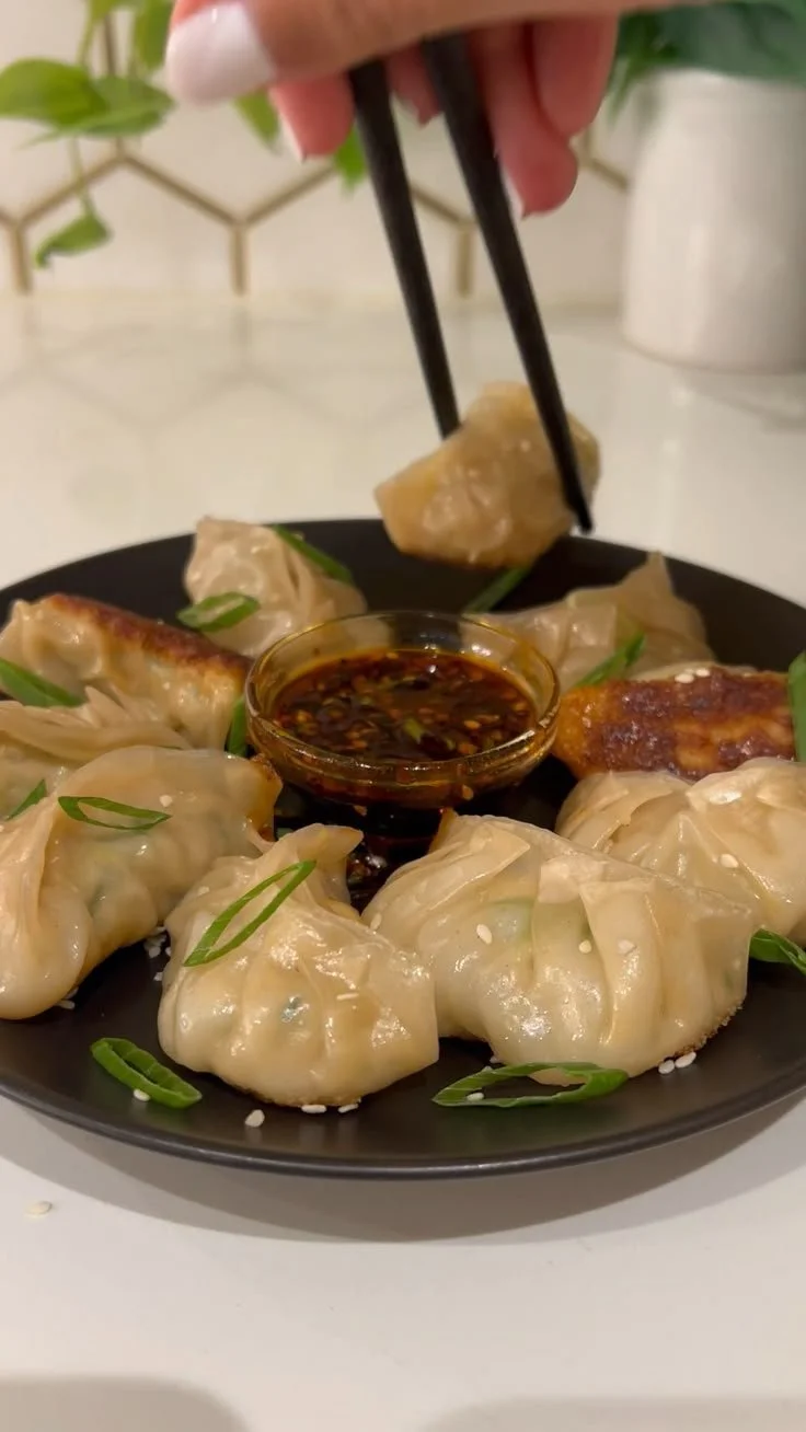 Delicious Chicken Potstickers - Pan Fried Dumplings with a crispy golden exterior