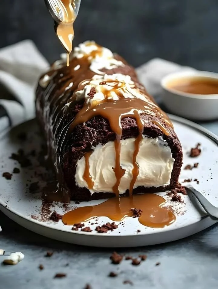 Delicious Chocolate Caramel Cream Roll showcasing rich chocolate and creamy caramel layers.