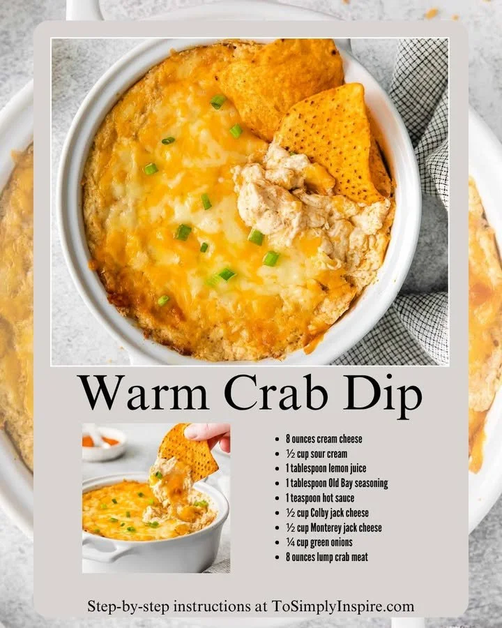 Delicious hot crab dip served in a bowl with crackers and herbs on the side.