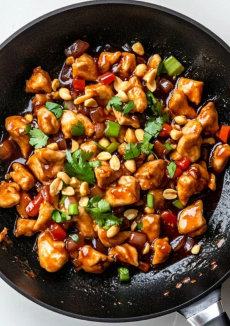 Delicious Keto Kung Pao Chicken served with vegetables and sauce