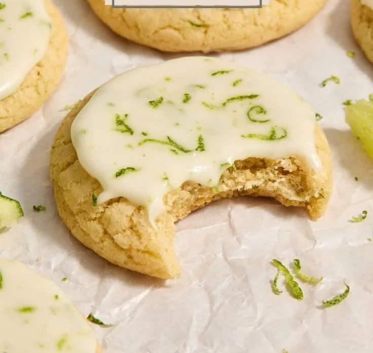 Plate of freshly baked Key Lime Cookies decorated with lime zest