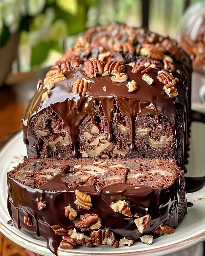 Luscious chocolate pecan cake with rich frosting and pecan topping