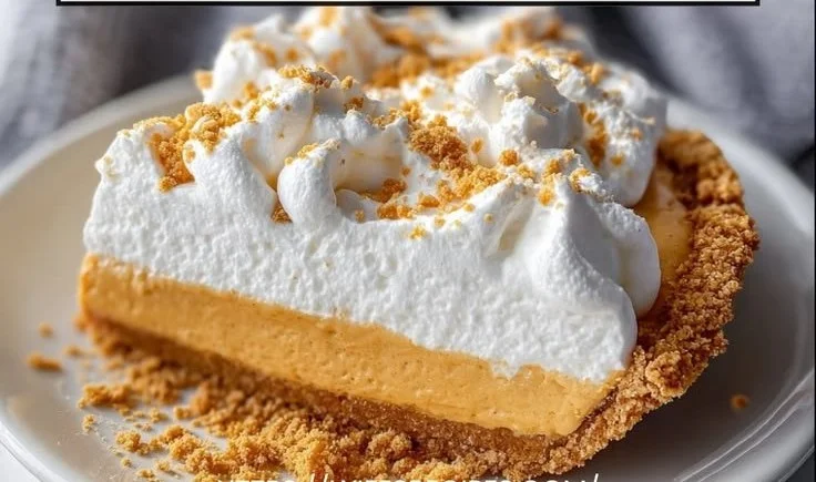Delicious no bake pumpkin fluff pie topped with whipped cream and spices