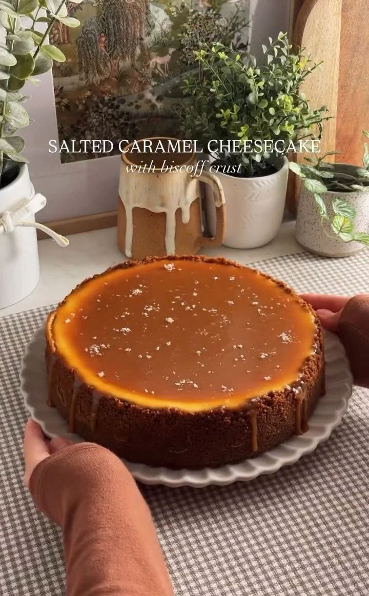 Delicious salted caramel cheesecake topped with drizzled caramel sauce
