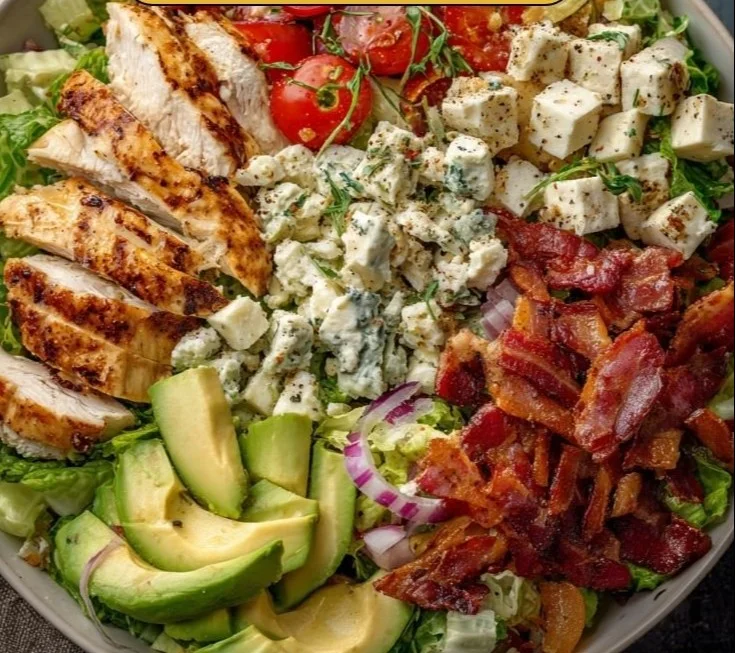 Savory BLT chicken salad with crispy bacon, lettuce, and tomatoes