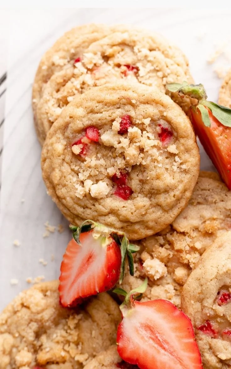 Strawberry Shortcake Cookies topped with fresh strawberries and cream