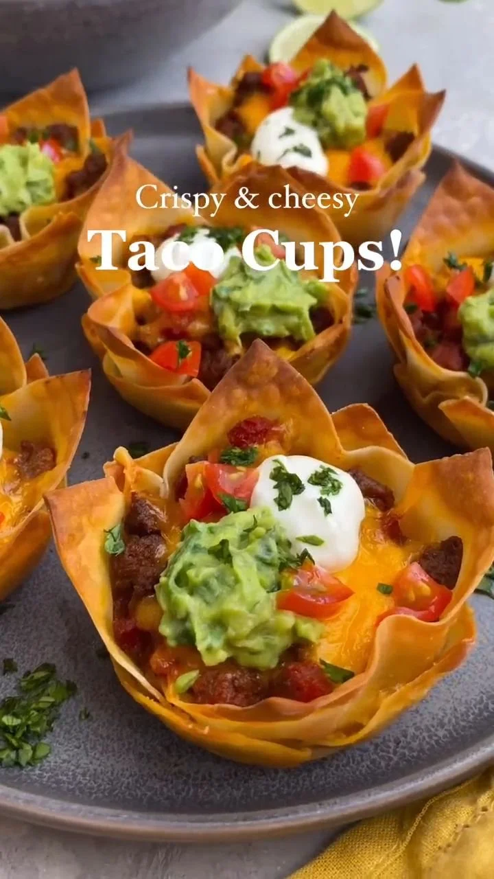 A plate of appetizing homemade Taco Cups filled with seasoned meat and toppings.