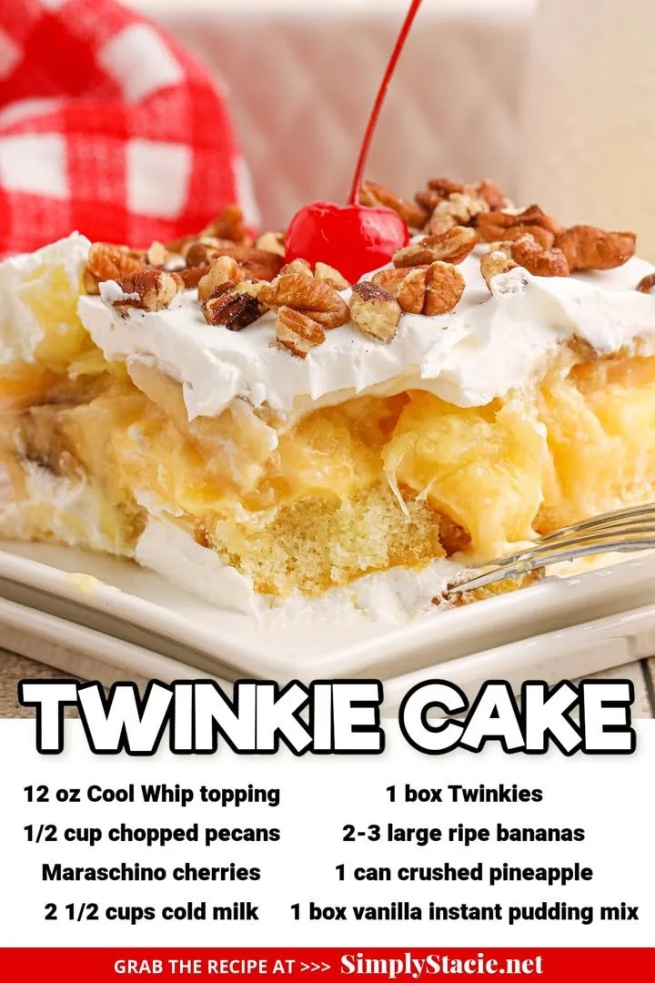 Delicious homemade Twinkie Cake displayed on a plate, topped with cream and sprinkles.